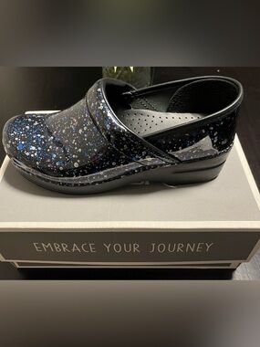 Dansko Black Glitter Patent Clog with Blue & Silver Flecks